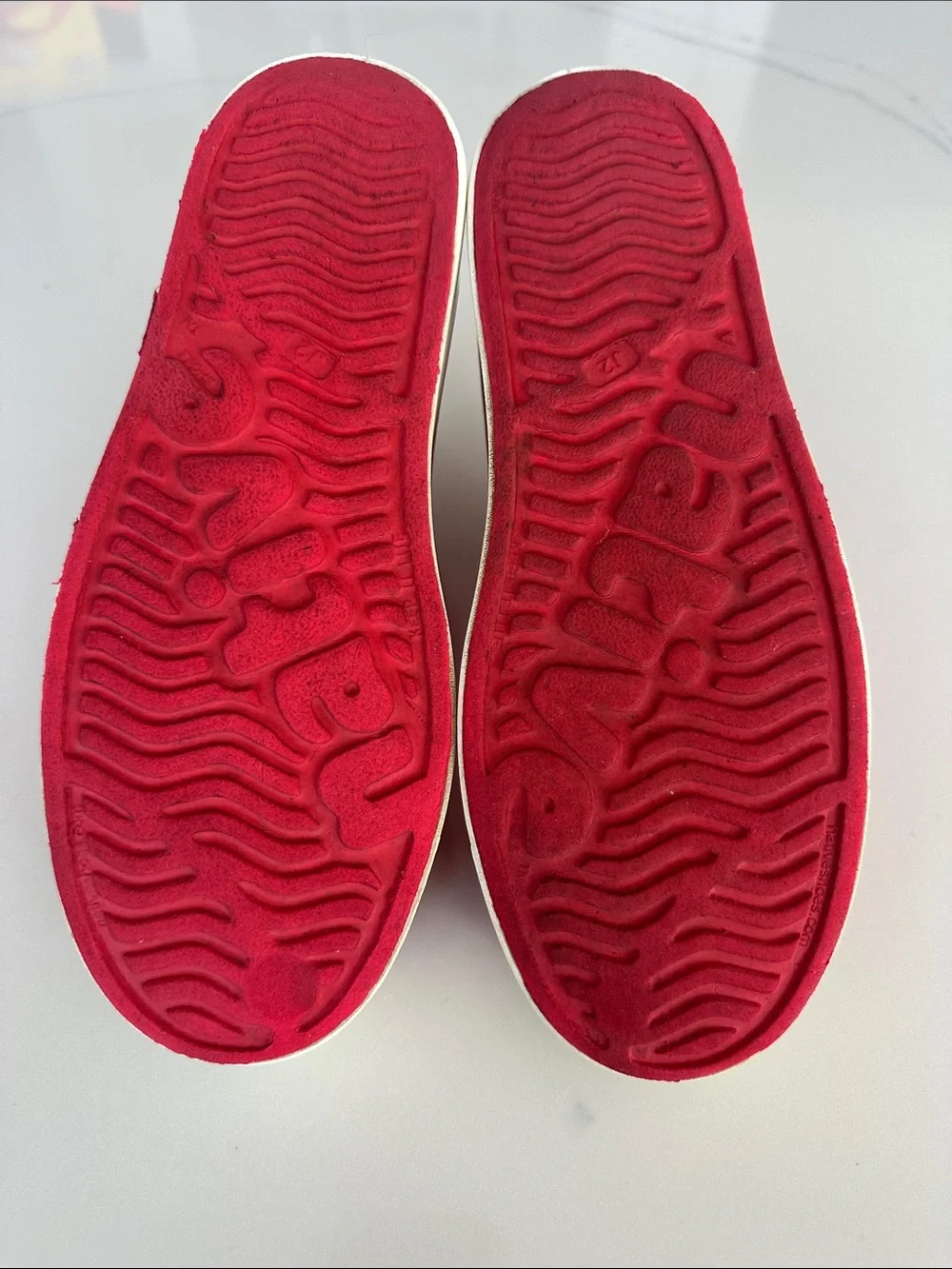 Native Red Slip-On Perforated Sneakers with White Soles